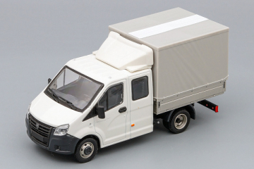ГАЗель Next A22R23 бортовой с тентом и спойлером, двойная кабина, белый/серый (1/43)